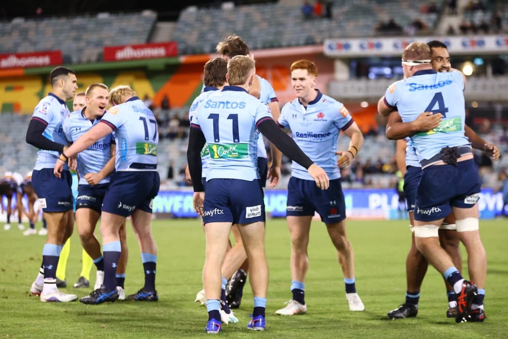 The NSW Waratahs celebrate a crucial, tense win over the ACT Brumbies. Photo: Getty Images