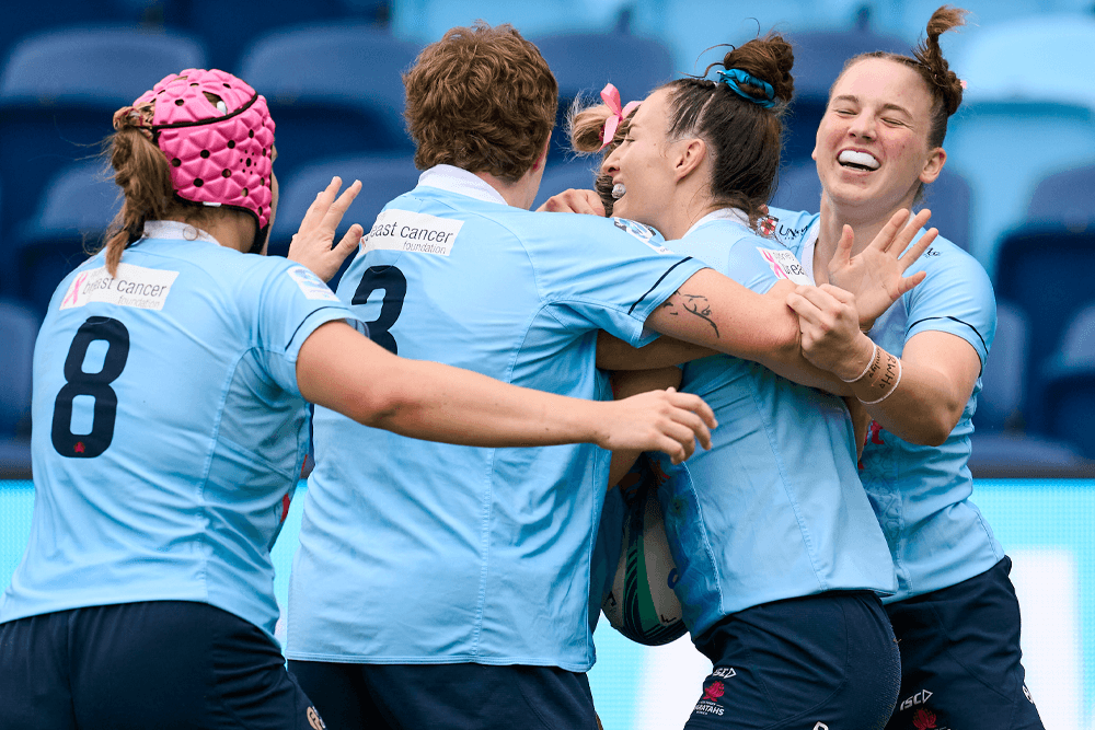 The NSW Waratahs Women celebrate Maya Stewart's first try