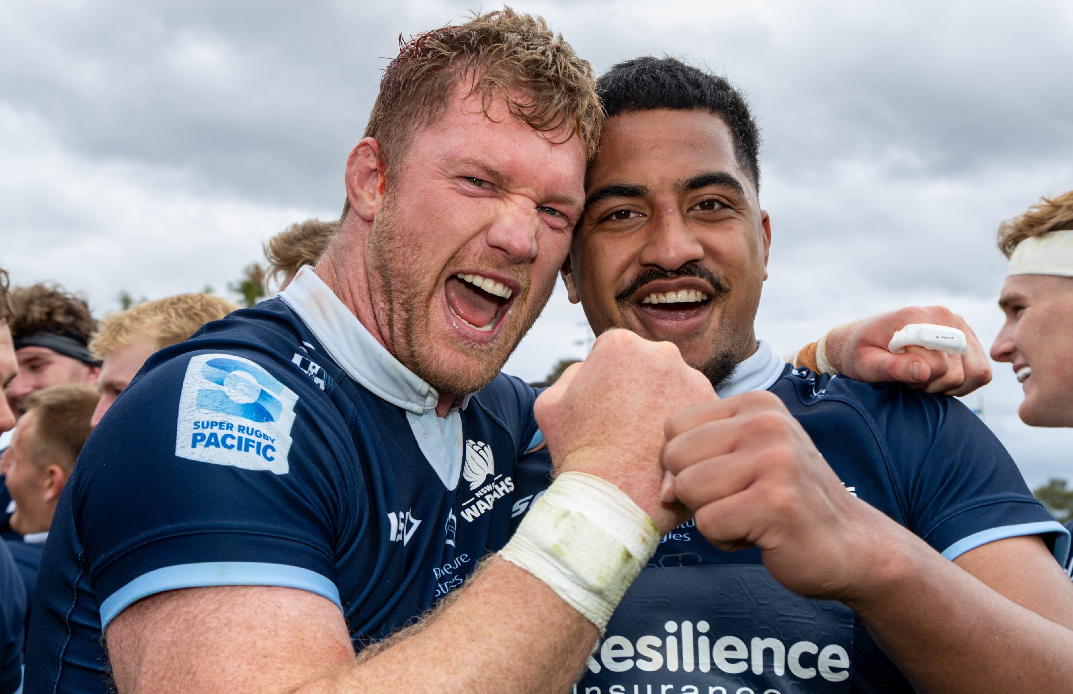 Matt Philip and Clem Halaholo after the 2025 Super Rugby AUS Grand Final.