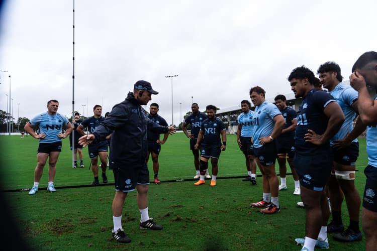 When NSW Waratahs set piece coach Dan Palmer (centre) talks, the forwards listen ... and learn, including Angus Bell (far left) 