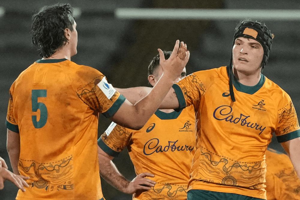 Waratahs product Ollie McCrea (right) celebrates Australia's win.