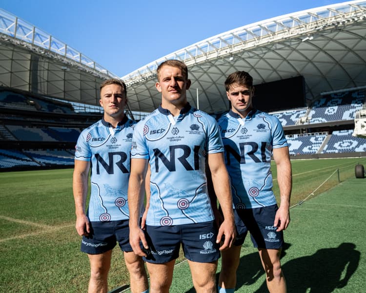 Buy Now: The official NSW Waratahs 2025 Lions Tour jersey, as worn by (left to right) Jack Bowen, Joey Walton and Teddy Wilson